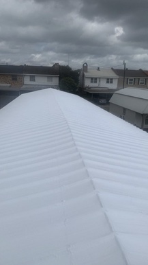 Completed metal roof replacement by Acadiana Roof Restoration